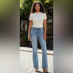 High rise Light Wash Flare Stretchy Jeans by James Jeans size 30